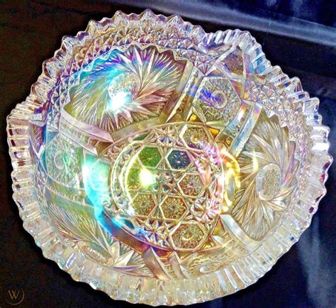' of dunkirk, indiana, a subsidiary of lancaster colony corporation. . Iridescent carnival glass bowl